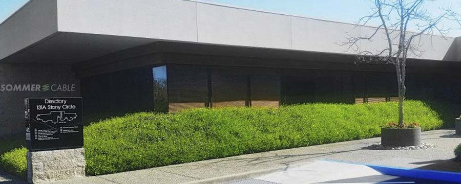 The black and gray building of our US branch in Santa Rosa, California.